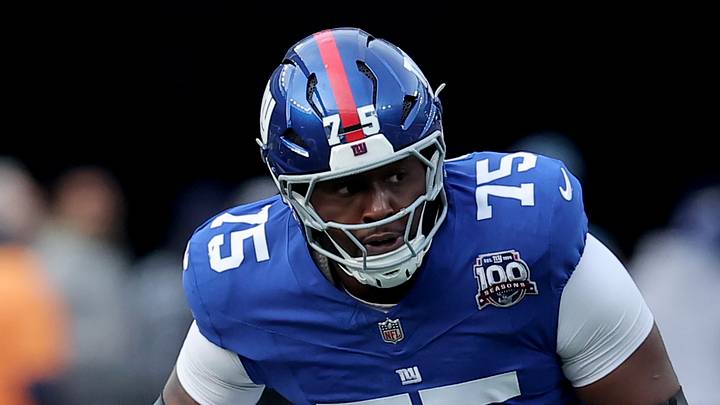 Dec 8, 2024; East Rutherford, New Jersey, USA; New York Giants guard Joshua Ezeudu (75) during the first quarter against the New Orleans Saints at MetLife Stadium. Mandatory Credit: Brad Penner-Imagn Images