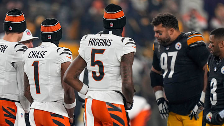 Cincinnati Bengals wide receiver Ja'Marr Chase (1), quarterback Joe Burrow (9) and wide receiver Tee Higgins (5) Cincinnati Bengals wide receiver Ja'Marr Chase (1), quarterback Joe Burrow (9) and wide receiver Tee Higgins (5)