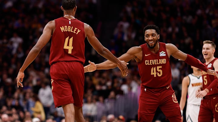 Dec 27, 2024; Denver, Colorado, USA; Cleveland Cavaliers guard Donovan Mitchell (45) reacts with forward Evan Mobley (4) after a play in the fourth quarter against the Denver Nuggets at Ball Arena. Mandatory Credit: Isaiah J. Downing-Imagn Images