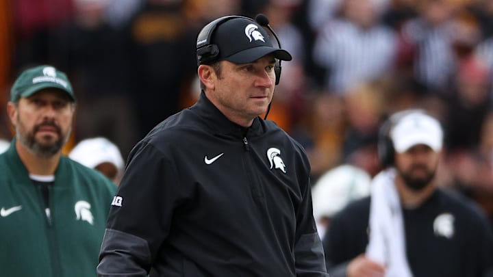 Nov 1, 2025; Minneapolis, Minnesota, USA; Michigan State Spartans head coach Jonathan Smith looks on during the first half against the Minnesota Golden Gophers at Huntington Bank Stadium.