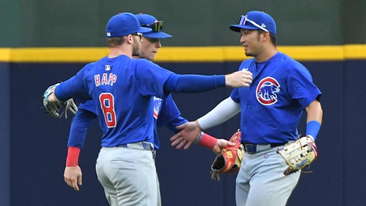 Jun 29, 2024; Milwaukee, Wisconsin, USA; Chicago Cubs outfielder Ian Happ (8), Chicago Cubs outfielder Pete Crow-Armstrong (52) and Chicago Cubs outfielder Seiya Suzuki (27) celebrate a 5-3 win over the Milwaukee Brewers at American Family Field.