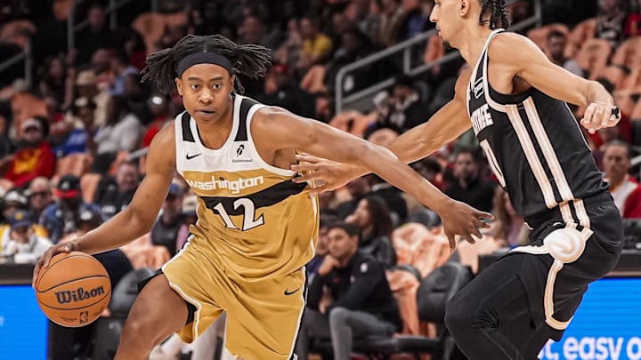 Feb 26, 2026; Atlanta, Georgia, USA; Washington Wizards guard Tre Johnson (12) dribbles against Atlanta Hawks fforward Zaccharie Risacher (10) during the first half at State Farm Arena. Mandatory Credit: Dale Zanine-Imagn Images Feb 26, 2026; Atlanta, Georgia, USA; Washington Wizards guard Tre Johnson (12) dribbles against Atlanta Hawks fforward Zaccharie Risacher (10) during the first half at State Farm Arena. Mandatory Credit: Dale Zanine-Imagn Images