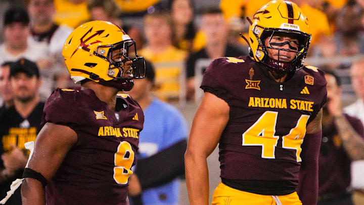 Aug 30, 2025; Tempe, Arizona, USA; Arizona State Sun Devils linebacker Keyshaun Elliott (44) and Arizona State Sun Devils linebacker Jordan Crook (8) celebrate in the second quarter between Arizona State Sun Devils and Northern Arizona Lumberjacks at Mountain America Stadium. Mandatory Credit: Arianna Grainey-Imagn Images