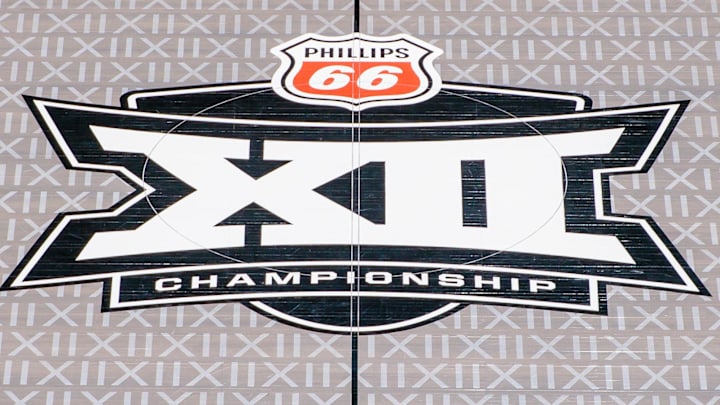 Mar 13, 2026; Kansas City, MO, USA; Big 12 logo center court after the LED floor was removed and a traditional wood floor was installed for the remaining tournament games prior to the game between the Iowa State Cyclones and the Arizona Wildcats at T-Mobile Center.