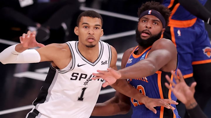 Nov 8, 2023; New York, New York, USA; San Antonio Spurs center Victor Wembanyama (1) fights for the ball against New York Knicks center Mitchell Robinson (23) during the first quarter at Madison Square Garden. Mandatory Credit: Brad Penner-Imagn Images Nov 8, 2023; New York, New York, USA; San Antonio Spurs center Victor Wembanyama (1) fights for the ball against New York Knicks center Mitchell Robinson (23) during the first quarter at Madison Square Garden. Mandatory Credit: Brad Penner-Imagn Images