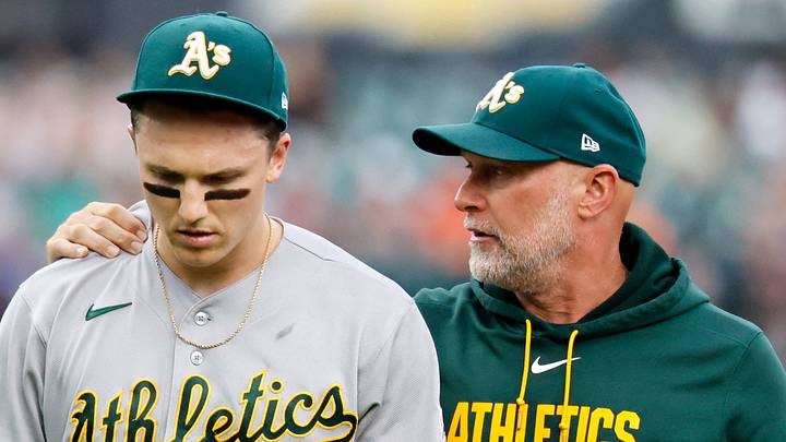 Jul 9, 2026; Detroit, Michigan, USA; Athletics third baseman Zack Gelof (20) walks off the field with manager Mark Kotsay (7) after he was in injured in the third inning against the Detroit Tigers at Comerica Park. Mandatory Credit: Rick Osentoski-Imagn Images Jul 9, 2026; Detroit, Michigan, USA; Athletics third baseman Zack Gelof (20) walks off the field with manager Mark Kotsay (7) after he was in injured in the third inning against the Detroit Tigers at Comerica Park. Mandatory Credit: Rick Osentoski-Imagn Images