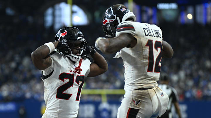 Nov 30, 2025; Indianapolis, Indiana, USA; Houston Texans wide receiver Nico Collins (12) celebrates with running back Woody Marks (27) after scoring a touchdown during the second half against the Indianapolis Colts at Lucas Oil Stadium. Mandatory Credit: Robert Goddin-Imagn Images Nov 30, 2025; Indianapolis, Indiana, USA; Houston Texans wide receiver Nico Collins (12) celebrates with running back Woody Marks (27) after scoring a touchdown during the second half against the Indianapolis Colts at Lucas Oil Stadium. Mandatory Credit: Robert Goddin-Imagn Images