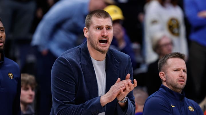 Jan 11, 2026; Denver, Colorado, USA; Denver Nuggets center Nikola Jokic reacts from the bench in the fourth quarter against the Milwaukee Bucks at Ball Arena.