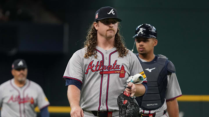Jul 26, 2025; Arlington, Texas, USA; Atlanta Braves starting pitcher Grant Holmes (66) walks in from the bullpen prior to a game against the Texas Rangers at Globe Life Field. Mandatory Credit: Raymond Carlin III-Imagn Images Jul 26, 2025; Arlington, Texas, USA; Atlanta Braves starting pitcher Grant Holmes (66) walks in from the bullpen prior to a game against the Texas Rangers at Globe Life Field. Mandatory Credit: Raymond Carlin III-Imagn Images