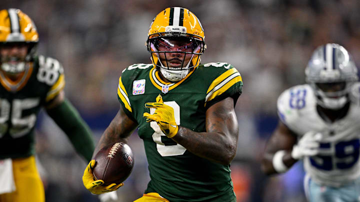 Sep 28, 2025; Arlington, Texas, USA; Green Bay Packers running back Josh Jacobs (8) runs with the ball during the game between the Dallas Cowboys and the Green Bay Packers at AT&T Stadium. Mandatory Credit: Jerome Miron-Imagn Images