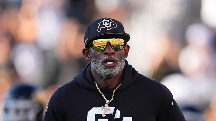 Aug 29, 2024; Boulder, Colorado, USA; Colorado Buffaloes head coach Deion Sanders runs onto the field before the game against the North Dakota State Bison at Folsom Field. Mandatory Credit: Ron Chenoy-USA TODAY Sports