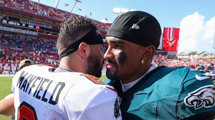 Philadelphia Eagles quarterback Jalen Hurts (1) greets Tampa Bay Buccaneers quarterback Baker Mayfield. Philadelphia Eagles quarterback Jalen Hurts (1) greets Tampa Bay Buccaneers quarterback Baker Mayfield.