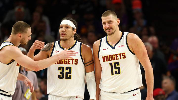 Mar 24, 2026; Phoenix, Arizona, USA; Denver Nuggets guard Christian Braun (0) celebrates with forward Aaron Gordon (32) and center Nikola Jokic (15) against the Phoenix Suns in the first half at Mortgage Matchup Center. Mandatory Credit: Mark J. Rebilas-Imagn Images Mar 24, 2026; Phoenix, Arizona, USA; Denver Nuggets guard Christian Braun (0) celebrates with forward Aaron Gordon (32) and center Nikola Jokic (15) against the Phoenix Suns in the first half at Mortgage Matchup Center. Mandatory Credit: Mark J. Rebilas-Imagn Images