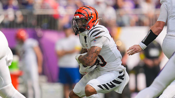 Sep 21, 2025; Minneapolis, Minnesota, USA; Cincinnati Bengals running back Chase Brown (30) runs with the ball during the first half against the Minnesota Vikings at U.S. Bank Stadium. Mandatory Credit: Brad Rempel-Imagn Images Sep 21, 2025; Minneapolis, Minnesota, USA; Cincinnati Bengals running back Chase Brown (30) runs with the ball during the first half against the Minnesota Vikings at U.S. Bank Stadium. Mandatory Credit: Brad Rempel-Imagn Images