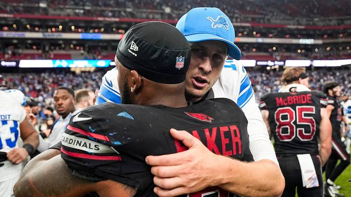 Detroit Lions quarterback Jared Goff (16) hugs Arizona Cardinals safety Budda Baker (3) after 45-21 win over Cardinals Detroit Lions quarterback Jared Goff (16) hugs Arizona Cardinals safety Budda Baker (3) after 45-21 win over Cardinals