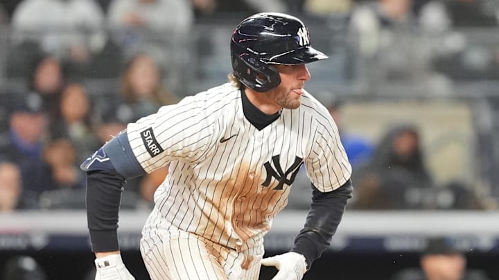 New York Yankees third baseman Ryan McMahon (19) runs out a ground ball and is safe on a fielding error by the Miami Marlins during the third inning at Yankee Stadium.