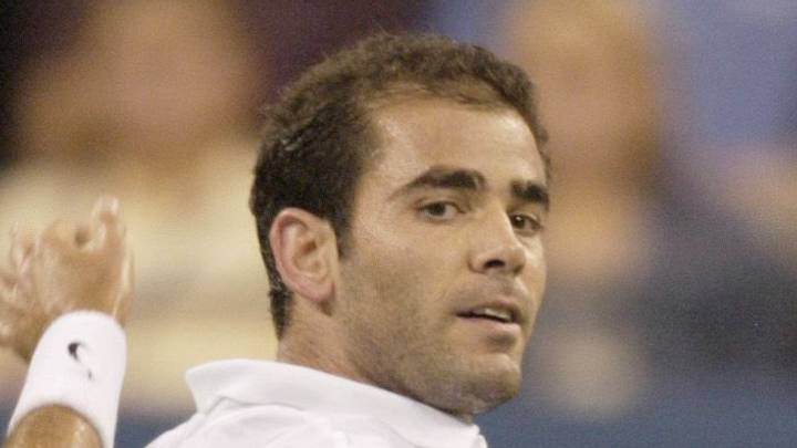 Pete Sampras hits a backhand Pete Sampras hits a backhand