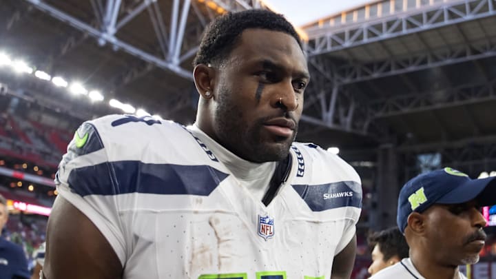 Dec 8, 2024; Glendale, Arizona, USA; Seattle Seahawks wide receiver DK Metcalf (14) against the Arizona Cardinals at State Farm Stadium. Mandatory Credit: Mark J. Rebilas-Imagn Images