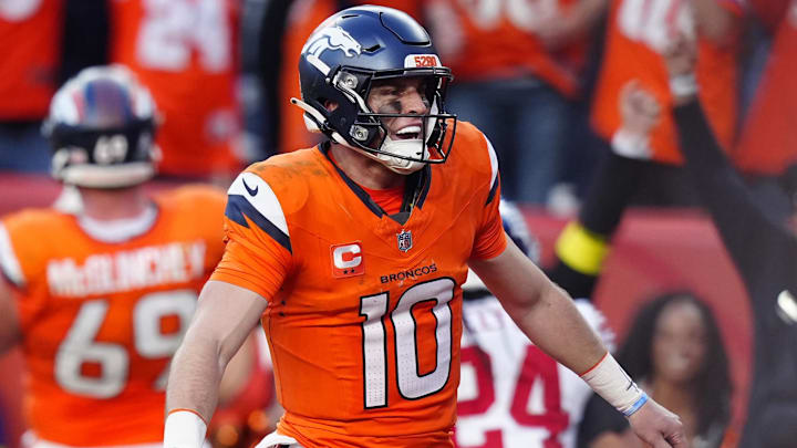 Oct 19, 2025; Denver, Colorado, USA; Denver Broncos quarterback Bo Nix (10) celebrates after play during the second half against the New York Giants at Empower Field at Mile High. 