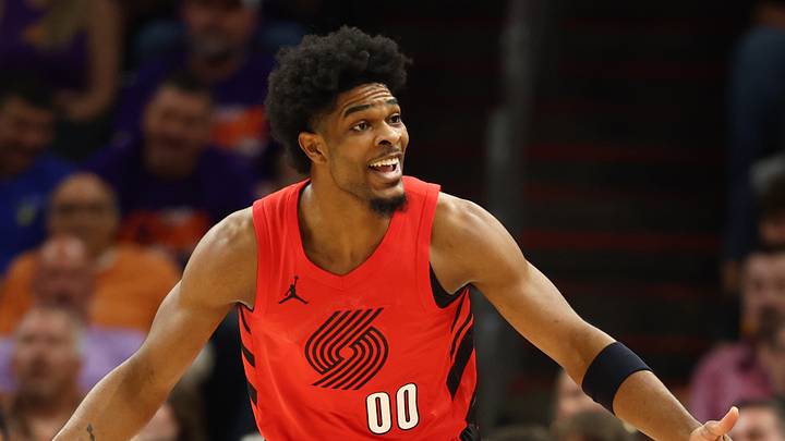 Apr 14, 2026; Phoenix, Arizona, USA; Portland Trail Blazers guard Scoot Henderson (00) reacts against the Phoenix Suns in the first half during the play-in rounds of the 2026 NBA Playoffs at Mortgage Matchup Center. Mandatory Credit: Mark J. Rebilas-Imagn Images