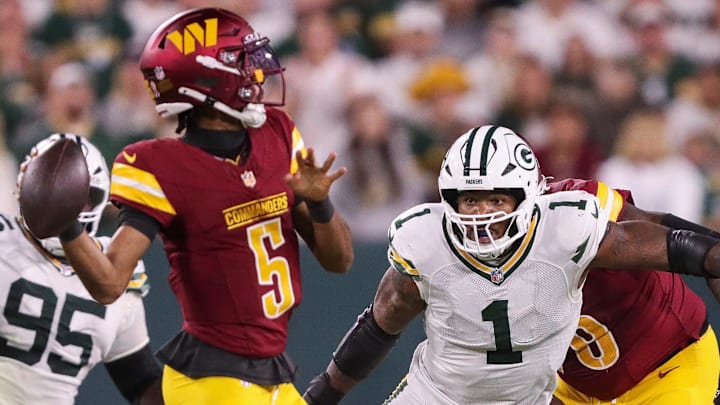 Green Bay Packers defensive end Micah Parsons (1) rushes Washington Commanders quarterback Jayden Daniels.