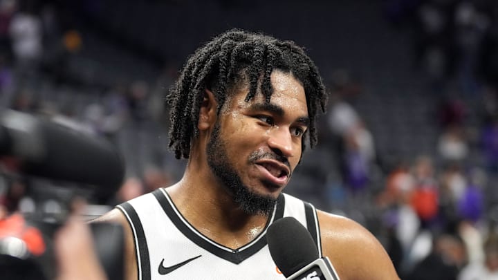 Nov 24, 2024; Sacramento, California, USA; Brooklyn Nets guard Cam Thomas (24) is interviewed after defeating the Sacramento Kings at Golden 1 Center. Mandatory Credit: Darren Yamashita-Imagn Images