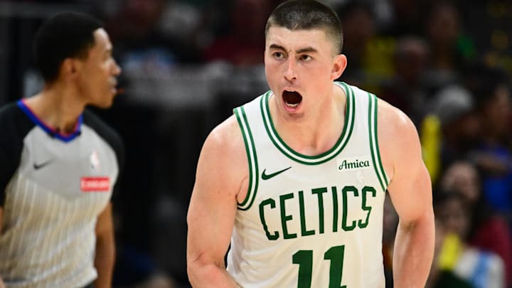 Mar 8, 2026; Cleveland, Ohio, USA; Boston Celtics guard Payton Pritchard (11) celebrates after hitting a three point basket against the Cleveland Cavaliers during the second half at Rocket Arena. Mandatory Credit: Ken Blaze-Imagn Images