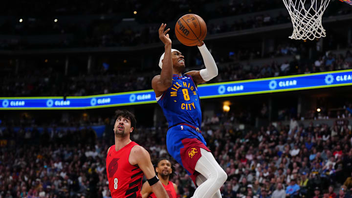 Mar 22, 2026; Denver, Colorado, USA; Denver Nuggets guard Peyton Watson (8) drives past Portland Trail Blazers forward Deni Avdija (8) in the first quarter at Ball Arena. Mandatory Credit: Ron Chenoy-Imagn Images Mar 22, 2026; Denver, Colorado, USA; Denver Nuggets guard Peyton Watson (8) drives past Portland Trail Blazers forward Deni Avdija (8) in the first quarter at Ball Arena. Mandatory Credit: Ron Chenoy-Imagn Images