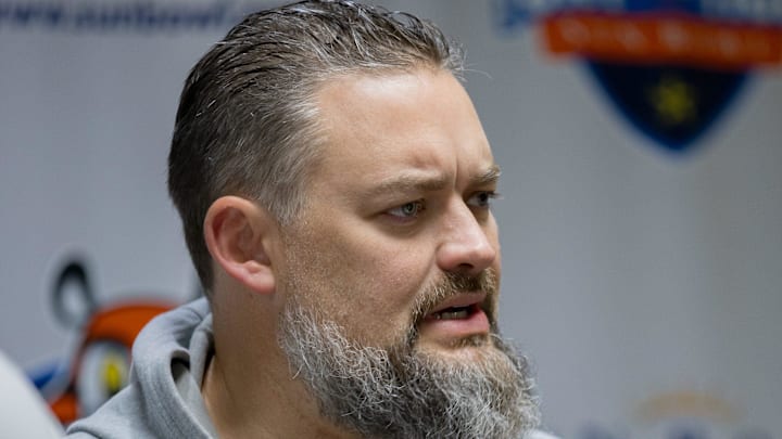 Brennan Carroll, Offensive Coordinator for the Washington football team, answers questions from the media during the coordinator news conference at the Hawthorn Suites in El Paso, Texas, on Saturday, Dec. 28, 2024.