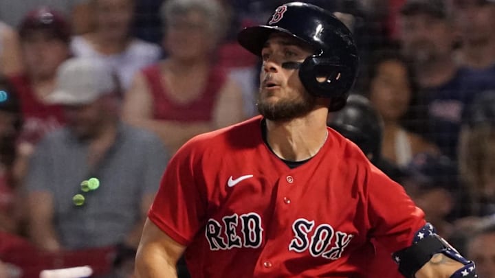 Former Boston Red Sox second baseman Michael Chavis (23) gets a base hit to drive in a run against the Kansas City Royals during the fourth inning at Fenway Park.