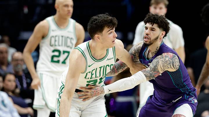 Mar 29, 2026; Charlotte, North Carolina, USA; Boston Celtics guard Hugo González (28) keeps the ball away from Charlotte Hornets guard LaMelo Ball (1) during the second half at Spectrum Center. Mandatory Credit: Brian Westerholt-Imagn Images Mar 29, 2026; Charlotte, North Carolina, USA; Boston Celtics guard Hugo González (28) keeps the ball away from Charlotte Hornets guard LaMelo Ball (1) during the second half at Spectrum Center. Mandatory Credit: Brian Westerholt-Imagn Images