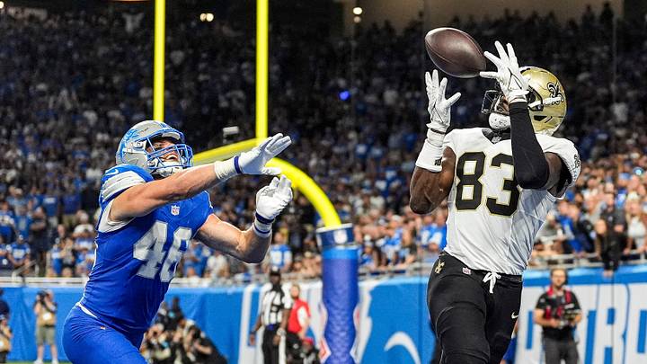 New Orleans Saints tight end Juwan Johnson (83) catches for a touchdown against Detroit Lions linebacker Jack Campbell (46) during the second half at Ford Field in Detroit on Sunday, Sept. 13, 2026. New Orleans Saints tight end Juwan Johnson (83) catches for a touchdown against Detroit Lions linebacker Jack Campbell (46) during the second half at Ford Field in Detroit on Sunday, Sept. 13, 2026.