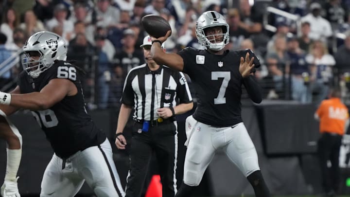 Nov 17, 2025; Paradise, Nevada, USA; Las Vegas Raiders quarterback Geno Smith (7) throws downfield against the Dallas Cowboys during the first half at Allegiant Stadium. Mandatory Credit: Kirby Lee-Imagn Images