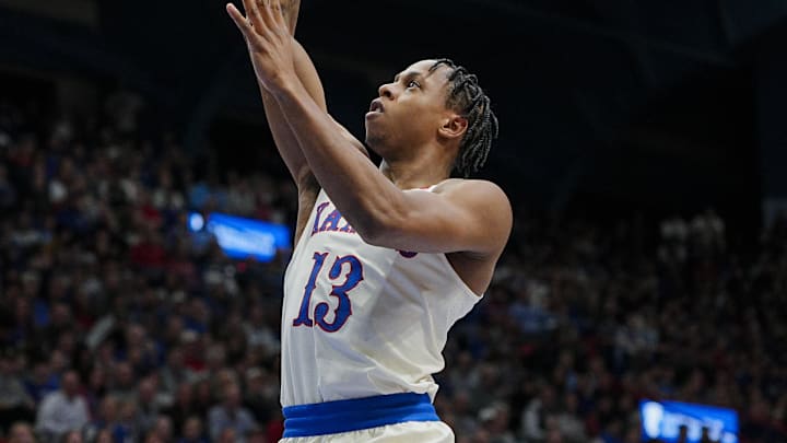 Nov 11, 2025; Lawrence, Kansas, USA; Kansas Jayhawks guard Elmarko Jackson (13) shoots against during the first half against the Texas A&M-Corpus Christi Islanders at Allen Fieldhouse. Mandatory Credit: Jay Biggerstaff-Imagn Images