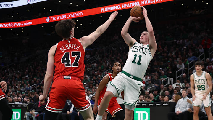 Feb 11, 2026; Boston, Massachusetts, USA; Boston Celtics guard Payton Pritchard (11) shoots over Chicago Bulls center Lachlan Olbrich (47) during the second quarter at TD Garden. Mandatory Credit: Winslow Townson-Imagn Images