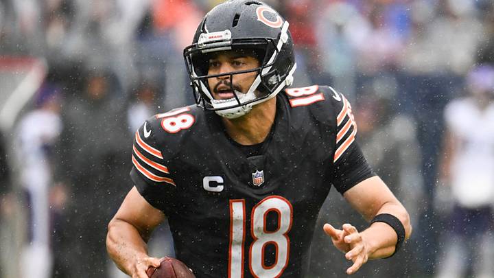 Sep 20, 2026; Chicago, Illinois, USA;  Chicago Bears quarterback Caleb Williams (18) scrambles against the Minnesota Vikings during the second half at Soldier Field.  Mandatory Credit: Matt Marton-Imagn Images