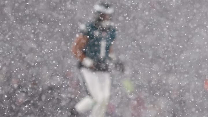 Philadelphia Eagles quarterback Jalen Hurts (1) is obscured by snow before a play against the Los Angeles Rams. Mandatory Credit: Bill Streicher-Imagn Images Philadelphia Eagles quarterback Jalen Hurts (1) is obscured by snow before a play against the Los Angeles Rams. Mandatory Credit: Bill Streicher-Imagn Images