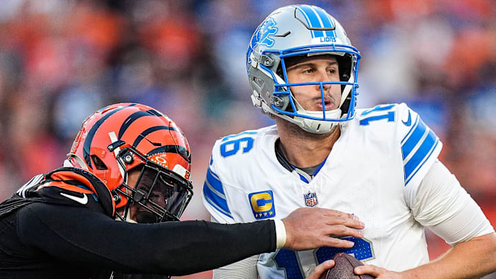 Detroit Lions quarterback Jared Goff (16) is sacked by Cincinnati Bengals defensive end Trey Hendrickson (91) 