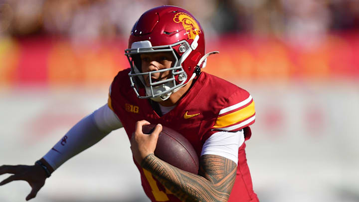Nov 16, 2024; Los Angeles, California, USA; Southern California Trojans quarterback Jayden Maiava (14) runs the ball against the Nebraska Cornhuskers during the first half at the Los Angeles Memorial Coliseum. Mandatory Credit: Gary A. Vasquez-Imagn Images Nov 16, 2024; Los Angeles, California, USA; Southern California Trojans quarterback Jayden Maiava (14) runs the ball against the Nebraska Cornhuskers during the first half at the Los Angeles Memorial Coliseum. Mandatory Credit: Gary A. Vasquez-Imagn Images