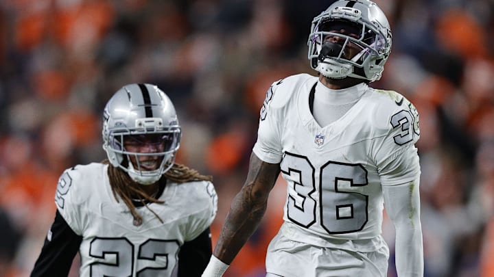 Nov 6, 2025; Denver, Colorado, USA; Las Vegas Raiders cornerback Kyu Blu Kelly (36) reacts after making an interception against the Denver Broncos during the first half at Empower Field at Mile High. Mandatory Credit: Isaiah J. Downing-Imagn Images