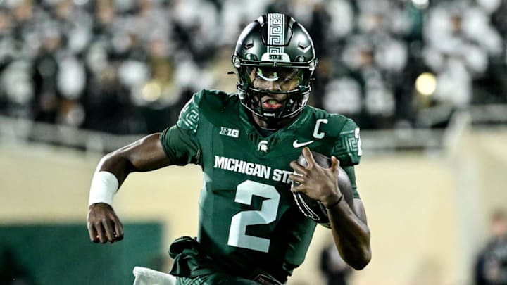 Michigan State's Aidan Chiles runs for a gain against Iowa in the second quarter on Saturday, Oct. 19, 2024, at Spartan Stadium in East Lansing.