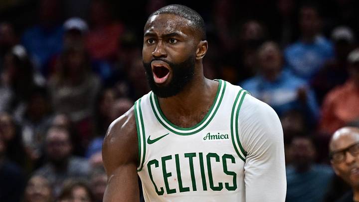 Nov 30, 2025; Cleveland, Ohio, USA; Boston Celtics guard Jaylen Brown (7) reacts after fouling Cleveland Cavaliers guard Donovan Mitchell (45) during the second half at Rocket Arena. Mandatory Credit: David Dermer-Imagn Images