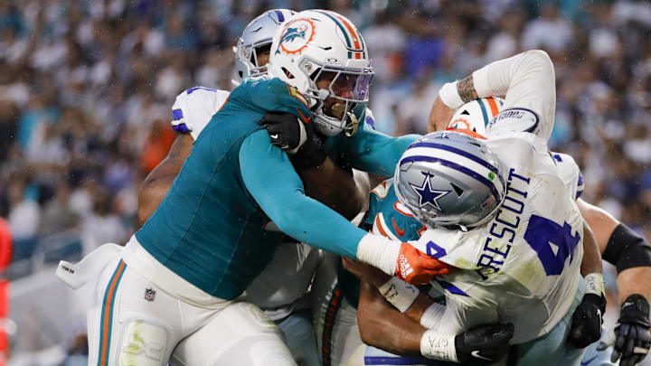 Miami Dolphins defensive tackle Christian Wilkins (94) and linebacker Bradley Chubb (2) tackle Dallas Cowboys quarterback Dak Prescott (4) during the second quarter at Hard Rock Stadium. Miami Dolphins defensive tackle Christian Wilkins (94) and linebacker Bradley Chubb (2) tackle Dallas Cowboys quarterback Dak Prescott (4) during the second quarter at Hard Rock Stadium.