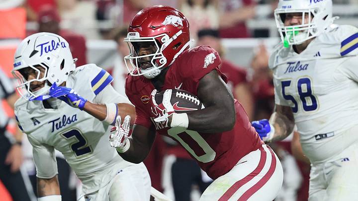 Arkansas Razorbacks running back Braylen Russell (0) rushes during the fourth quarter against the Tulsa Golden Hurricanes at Razorback Stadium. Arkansas Razorbacks running back Braylen Russell (0) rushes during the fourth quarter against the Tulsa Golden Hurricanes at Razorback Stadium.