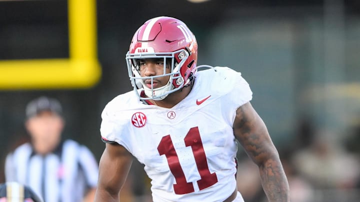 Alabama Crimson Tide linebacker Jihaad Campbell sneaks a peek into the backfield against the Vanderbilt Commodores.
