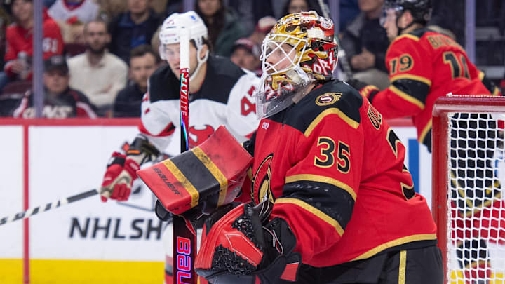 Dec 9, 2025; Ottawa, Ontario, CAN; Ottawa Senators goalie Linus Ullmark (35) makes a save on a shot from New Jersey Devils left wing Paul Coter (47) in the second period at the Canadian Tire Centre. Mandatory Credit: Marc DesRosiers-IMAGN Images