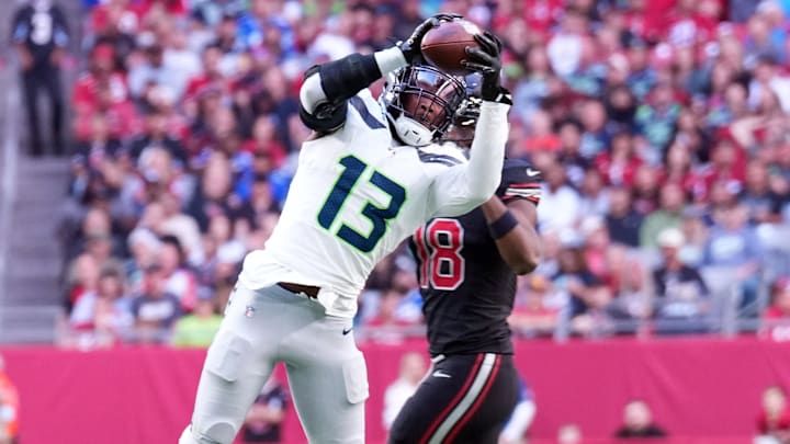 Dec 8, 2024; Glendale, Arizona, USA; Seattle Seahawks linebacker Ernest Jones IV (13) intercepts a pass against the Arizona Cardinals during the first half at State Farm Stadium. Mandatory Credit: Joe Camporeale-Imagn Images