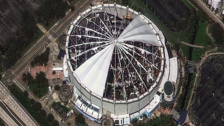 The roof of Tropicana Field, home of the Tampa Bay Rays MLB team, was torn off by Hurricane Milton's powerful winds. Satellite imagery from Maxar shows the destruction on Oct. 10, 2024 The roof of Tropicana Field, home of the Tampa Bay Rays MLB team, was torn off by Hurricane Milton's powerful winds. Satellite imagery from Maxar shows the destruction on Oct. 10, 2024