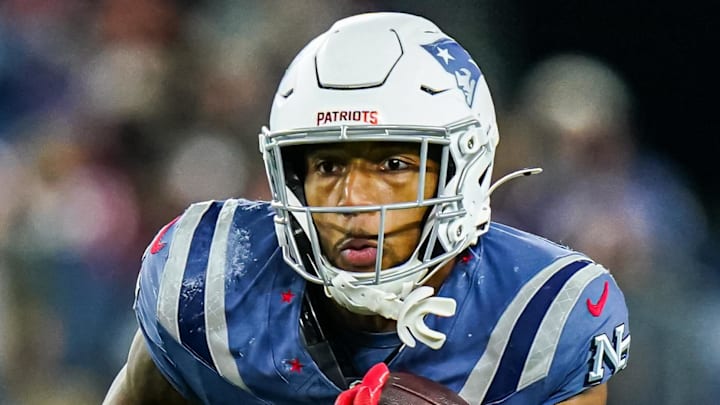 Nov 13, 2025; Foxborough, Massachusetts, USA; New England Patriots running back Treveyon Henderson (32) runs the ball against the New York Jets in the second quarter at Gillette Stadium. Mandatory Credit: David Butler II-Imagn Images