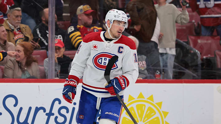 Dec 30, 2025; Sunrise, Florida, USA; Montreal Canadiens center Nick Suzuki (14) looks on after scoring against the Florida Panthers during the third period at Amerant Bank Arena. Mandatory Credit: Sam Navarro-Imagn Images